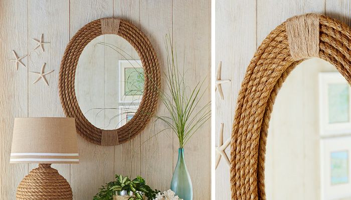 Customize an oval mirror by framing it with coils of rope....