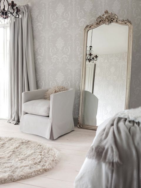 Love the wallpaper! And that mirror looks a lot like one I scored at a garage sa...
