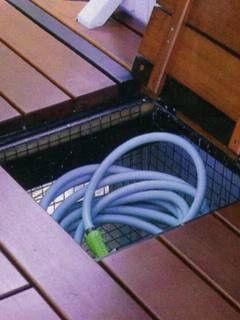 deck org- Add a wire basket under you deck for additional outdoor storage space....
