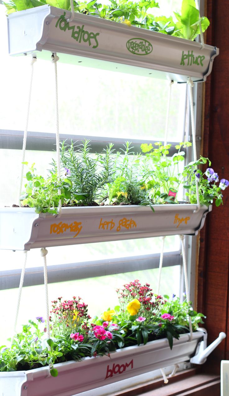 DIY Hanging Gutter Planter - it's easy to make these planters and you can st...