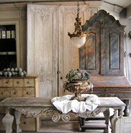 French table, antique cupboard.
