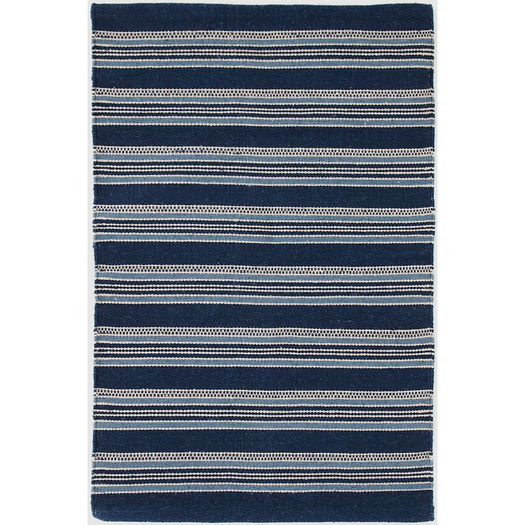 Based on an antique textile found at Brimfield, this indoor/outdoor rug has a ri...