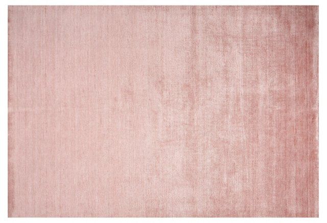 This baby pink area rug is super luxe and unique.