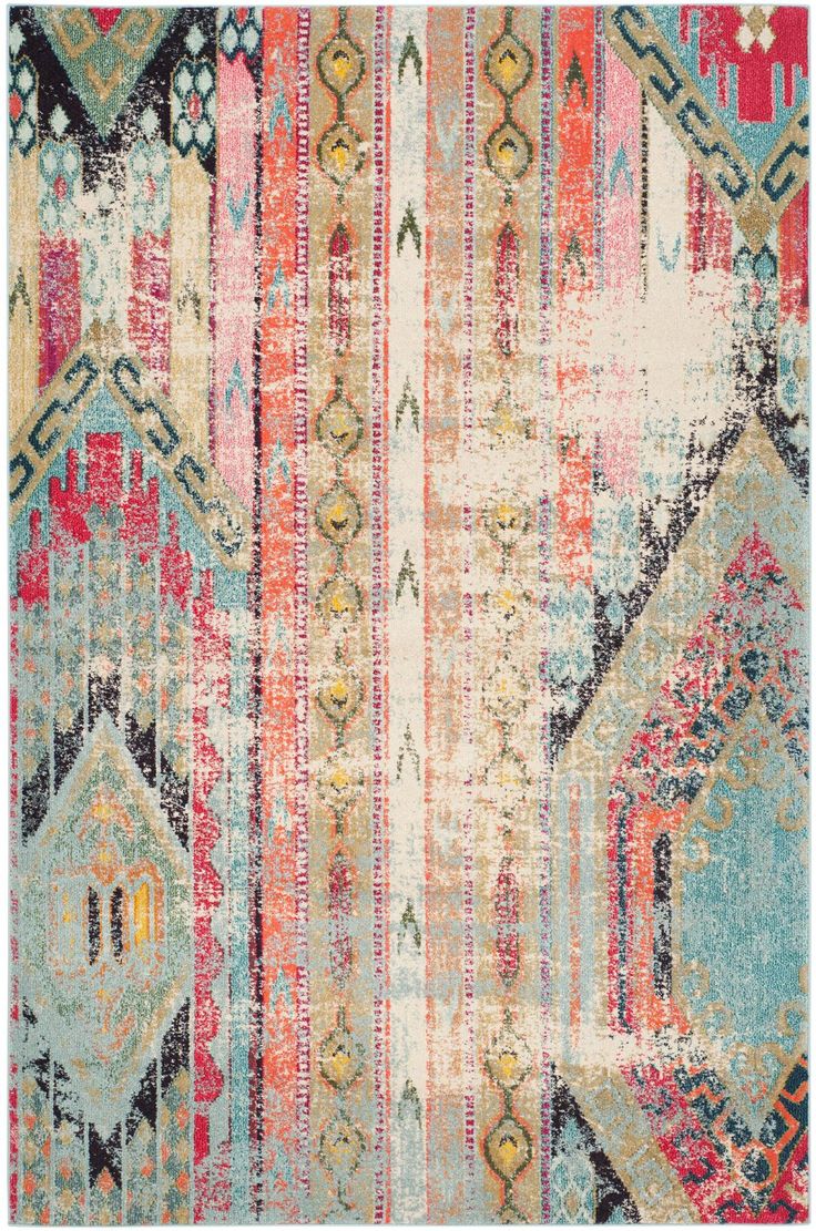 This Safavieh Monaco area rug is our top choice for the room - it ties our color...