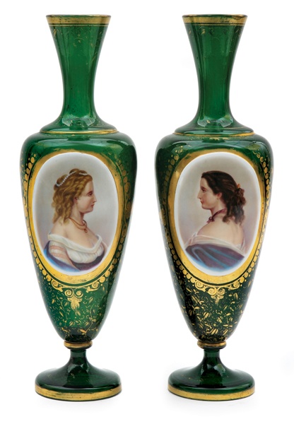 A pair of Bohemian green glass portrait vases, each of baluster form on a footed...