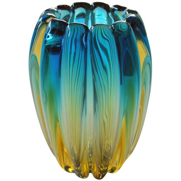 A shimmering and thickly-modeled Murano mid-century melon-ribbed teal and gold a...