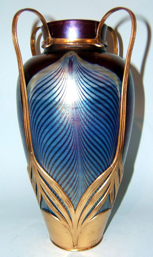 A stunning Loetz and Osiris art nouveau vase c1900. Peacock feather decoration i...