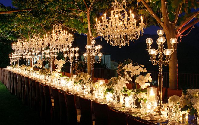 outdoor chandeliers and candles at reception...