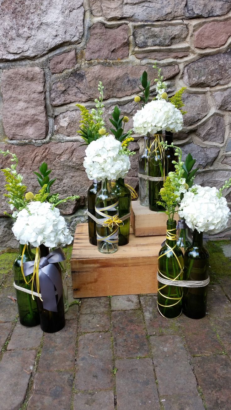 Blossom Bliss Florist Wedding Centerpiece: Reclaimed wine bottle w/ hydrangeas+y...