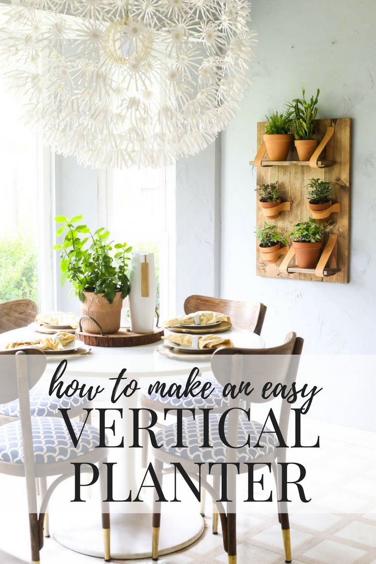 This DIY vertical wall planter is so gorgeous, and so simple! Great ideas for ma...