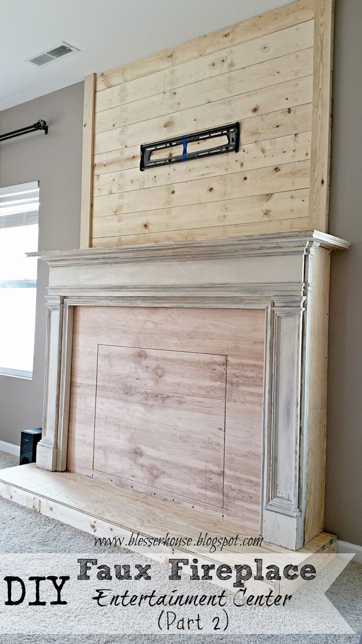 DIY Faux Fireplace Entertainment Center: How to build a plank wall faux chimney ...