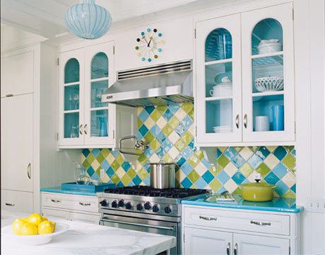 I love how they did the tile! really easy to decorate the rest of the kitchen wi...
