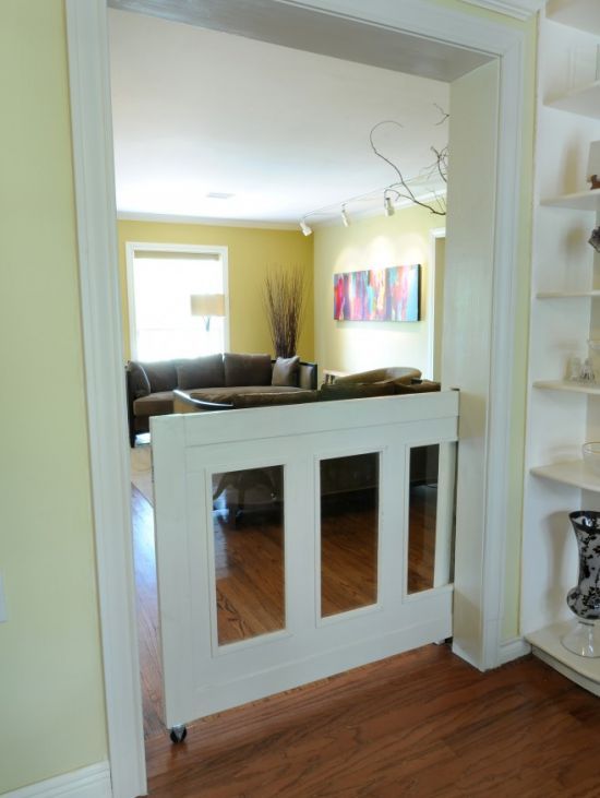 no more baby gates - use a standard door turned on its side with pocket door har...