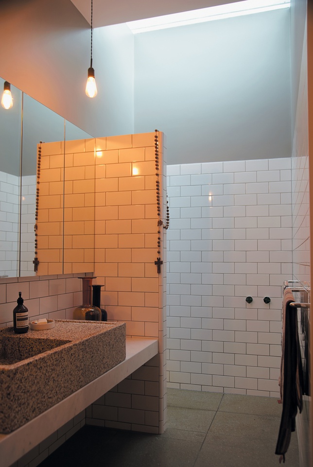the en suite master bathroom that sits just behind their inexpensive walk-in clo...