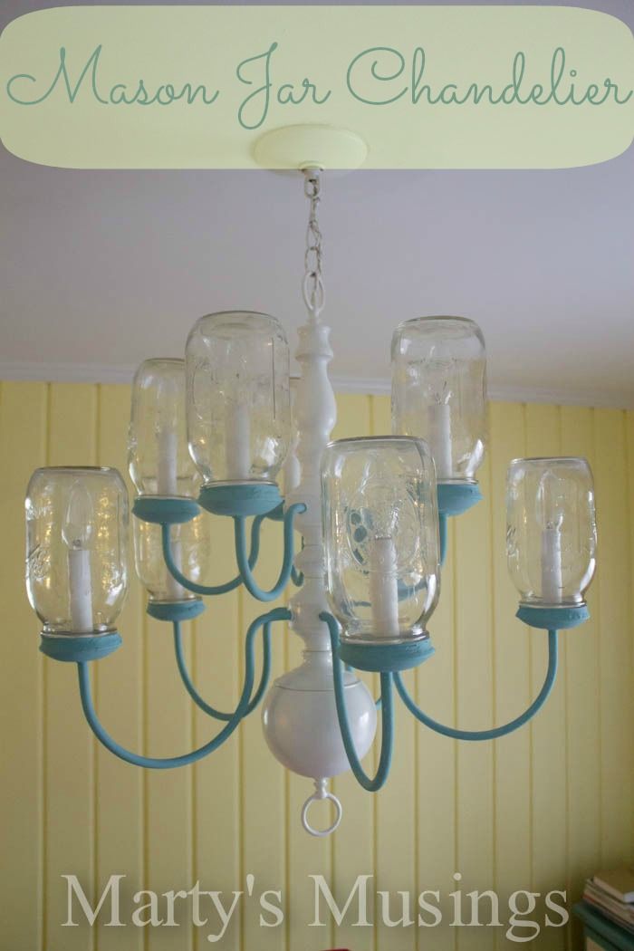 This unique DIY Mason Jar Chandelier is made from an old 10 light brass chandeli...