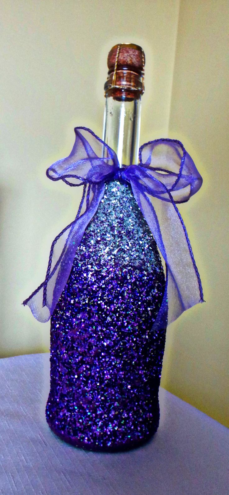 glittered champagne bottle-Made this for my wedding as a centerpiece. Used 3m sp...