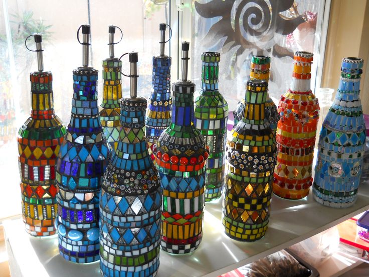 mosaic bottles..glorious!! THIS is what I have been gluing up all those wine bot...