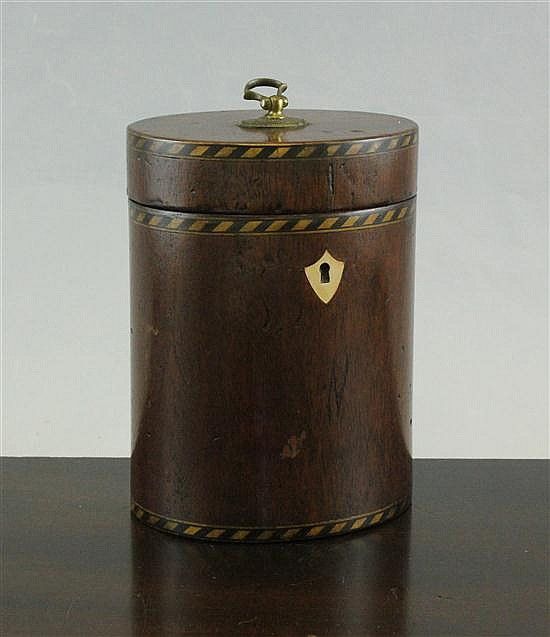 A George III mahogany oval tea caddy, 4.25ins via invaluable.com