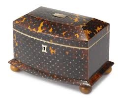 A William IV TORTOISESHELL and Ivory TEA CADDY, circa 1835 - The bow-fronted dom...