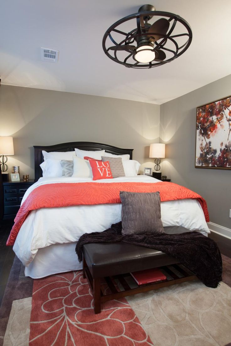 MASTER BEDROOM, AFTER: This newly renovated bedroom is warm and inviting with br...
