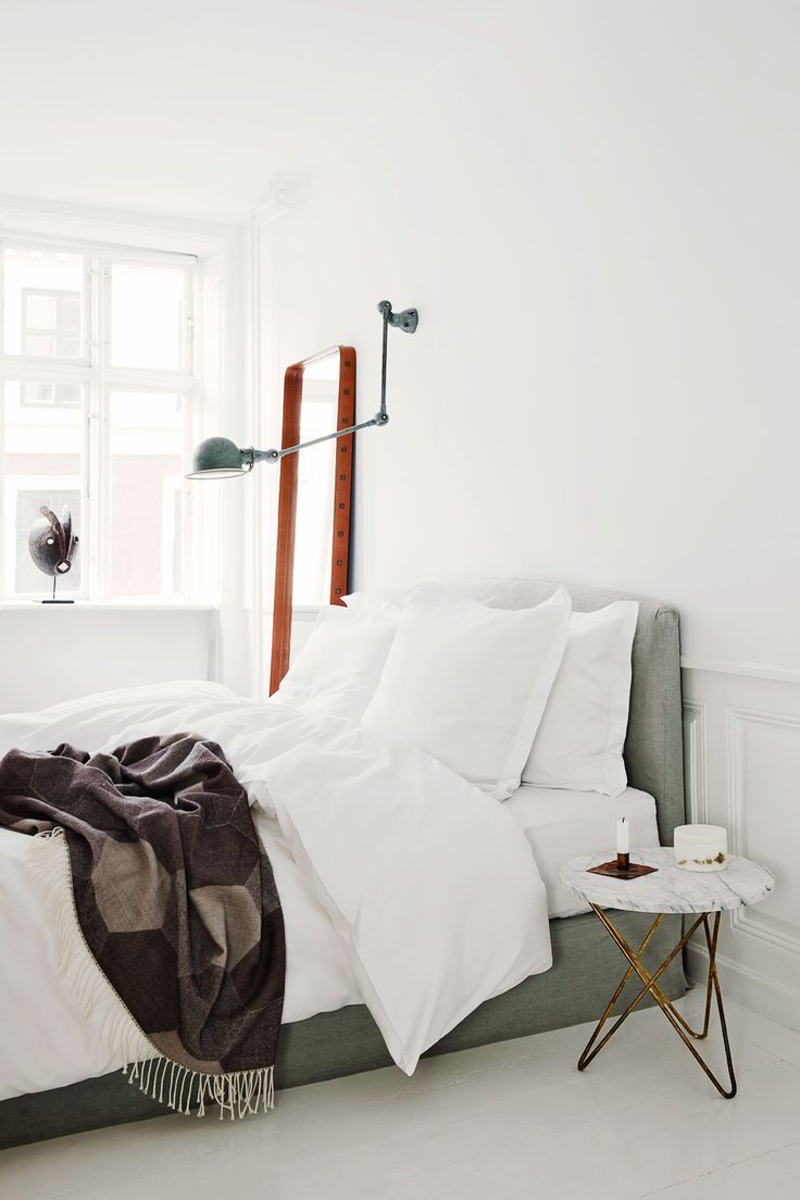 White bedroom with minimal décor