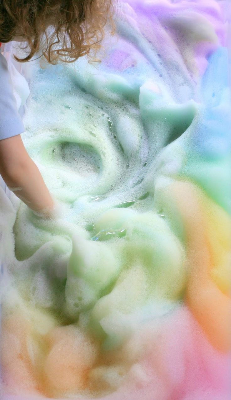 rainbow soap foam bubbles sensory play.