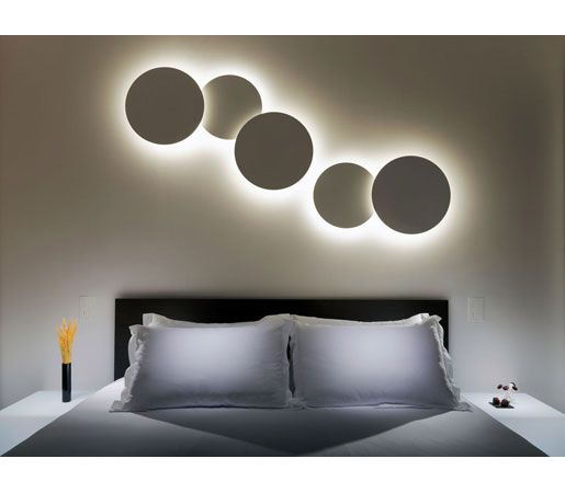 Comprised of two disks to create a warm, visually sharp effect, the PUCK WALL AR...