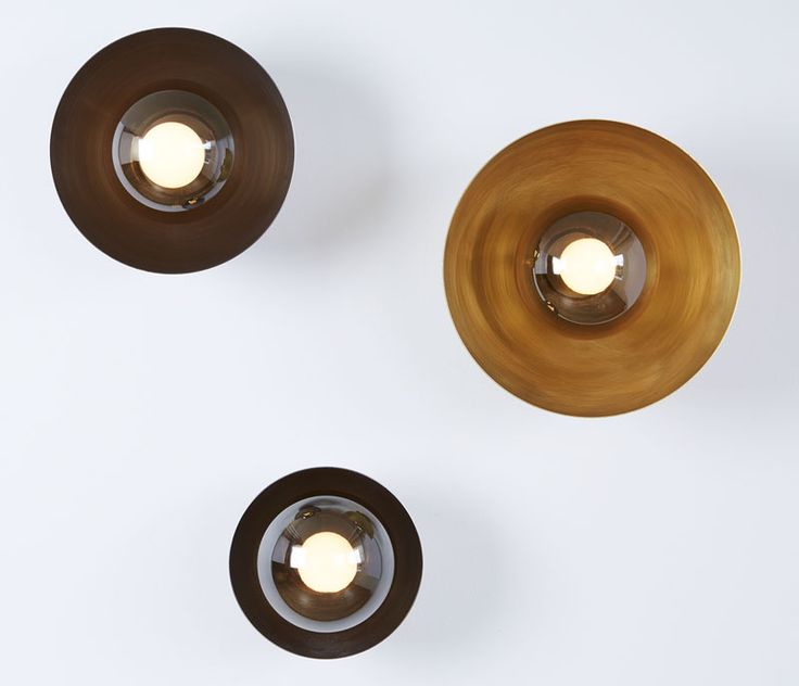 These modern wall light fixtures can be installed on the ceiling, adding an arti...