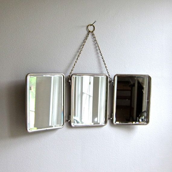 Travel mirror as wall mirror. Could be DIY duplication?