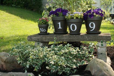 Love these planters with house numbers!