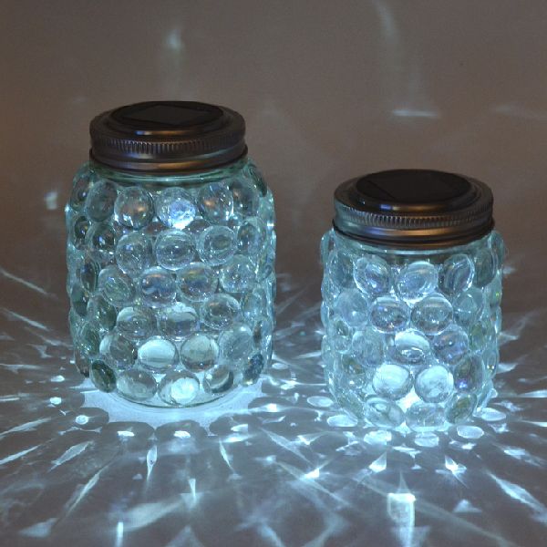 These super simple mason jar luminaries require very little in tools, supplies a...
