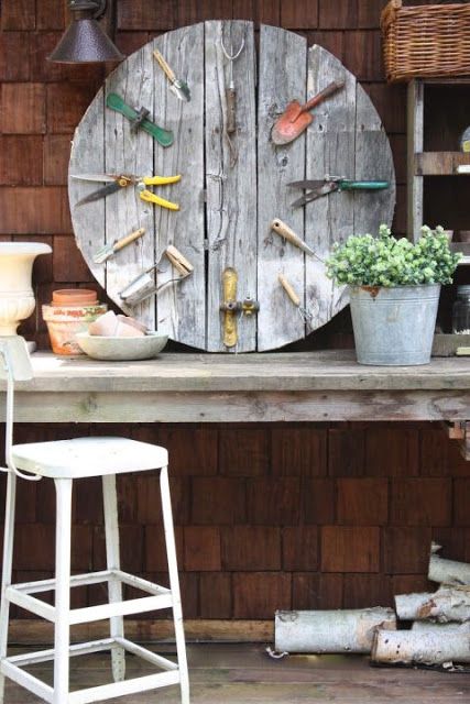 What fun outdoor decor! I love the use of old gardening tools