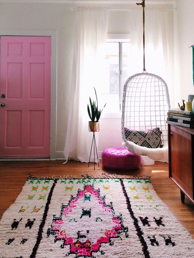 crushing on this azilal pink rug with the pink door and hanging rattan chair