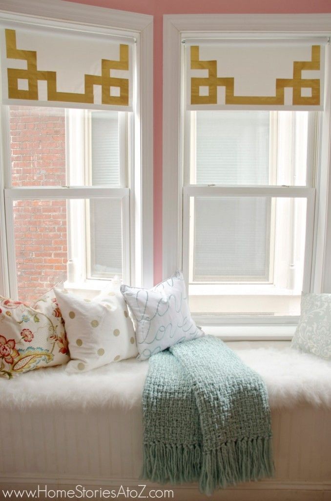 How to dress up simple roller shades using gold duct tape in a Greek Key design....