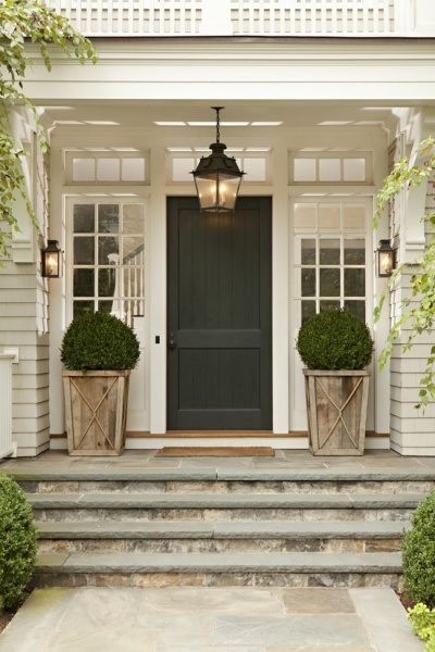 Stunning front porch. Love the elegant rustic simplicity of it all!
