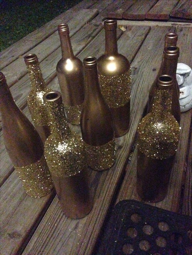 Decorative Bottles : Metallic gold spray paint and I waited about a
