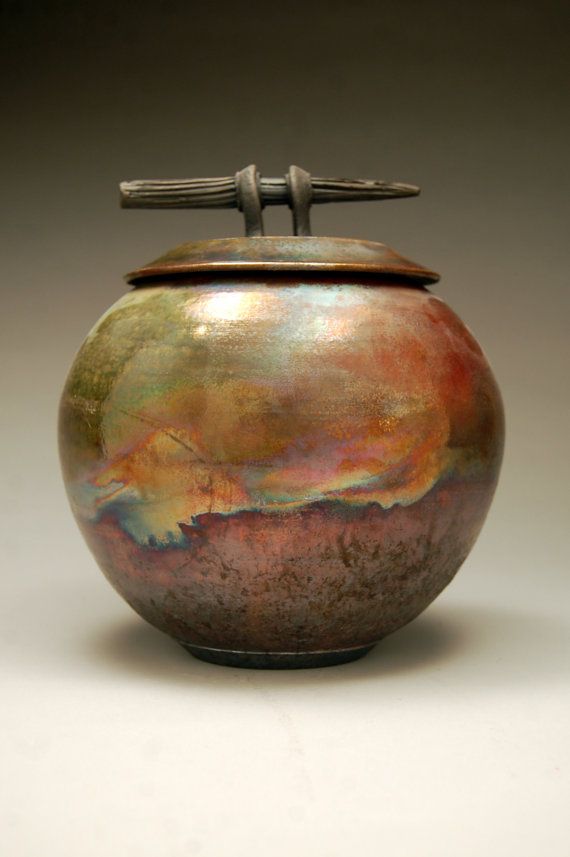 A beautiful piece of raku pottery - it brings in so many rustic colors.