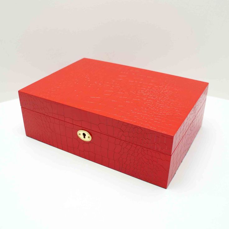 Red Patterned Lacquer Jewelry Box. This roomy alligator patterned jewelry box is...
