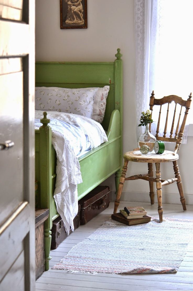 Green, wooden bed