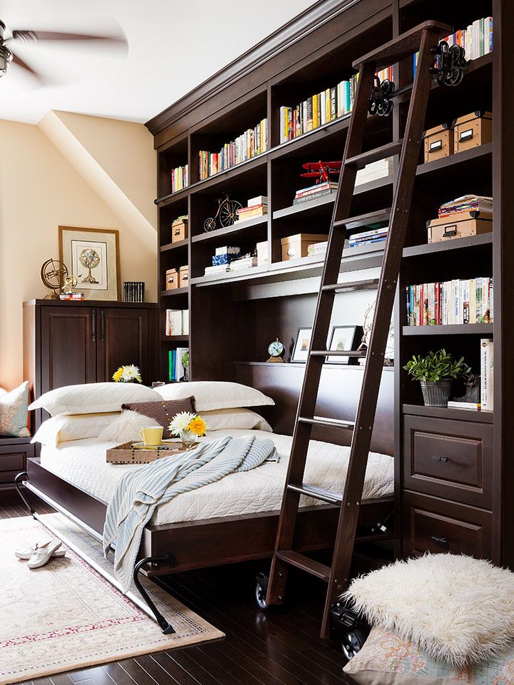 Library bedroom | Add a beautiful rolling ladder to access your books on the top...