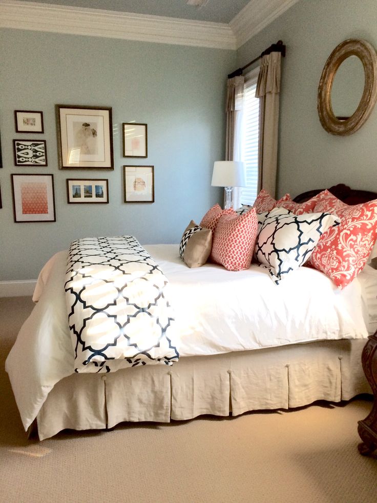 Linen, navy, and coral bedroom