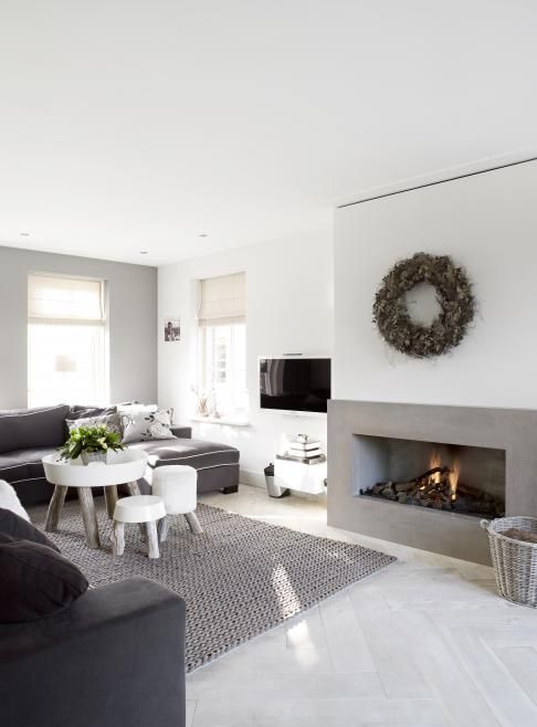 contemporary living room in white and grey with rustic elements incl' pretty...