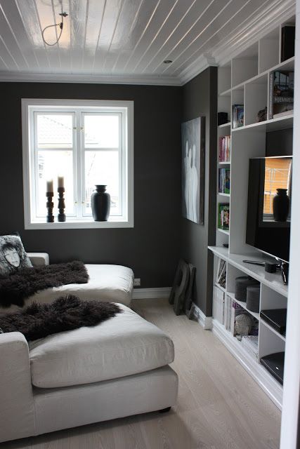 Great small space - light floors, white shelving and ceiling with short dark acc...