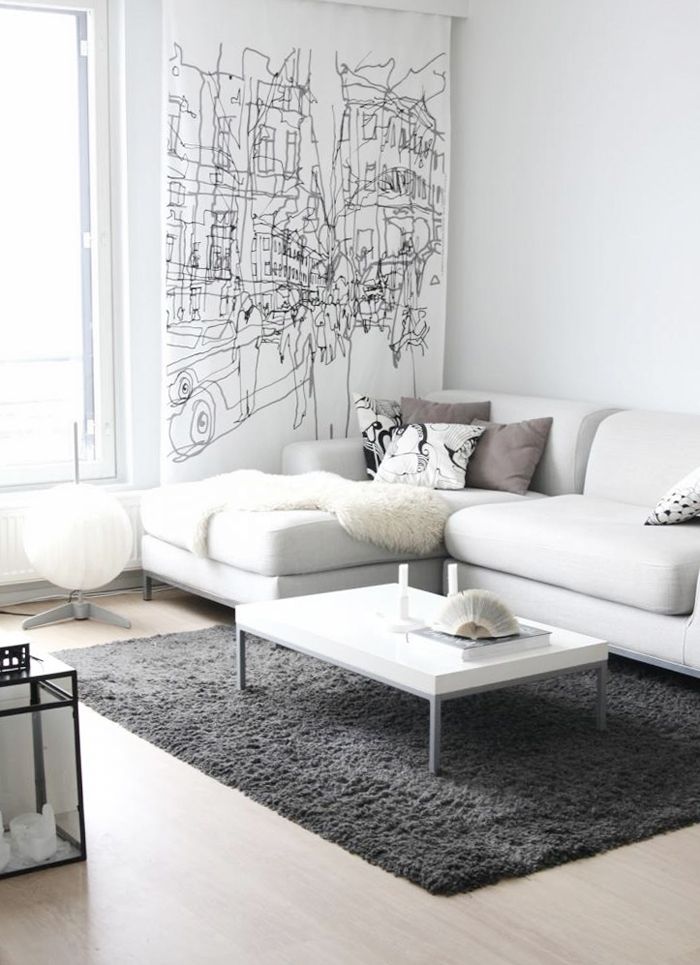 light grey + corner sofa + over-scale art + lots of sunlight