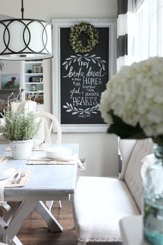 Farmhouse dining space with painted x-base table from Better Homes and Gardens...