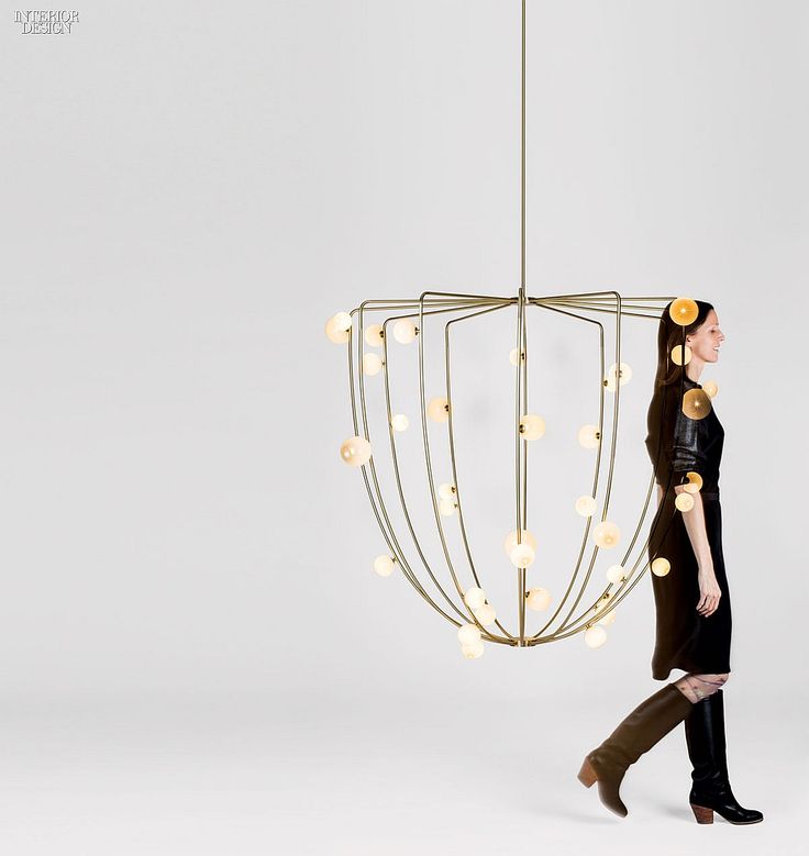 Bubbles on a fisherman's trap inspired Lindsey Adelman Studio's brass chandelier...