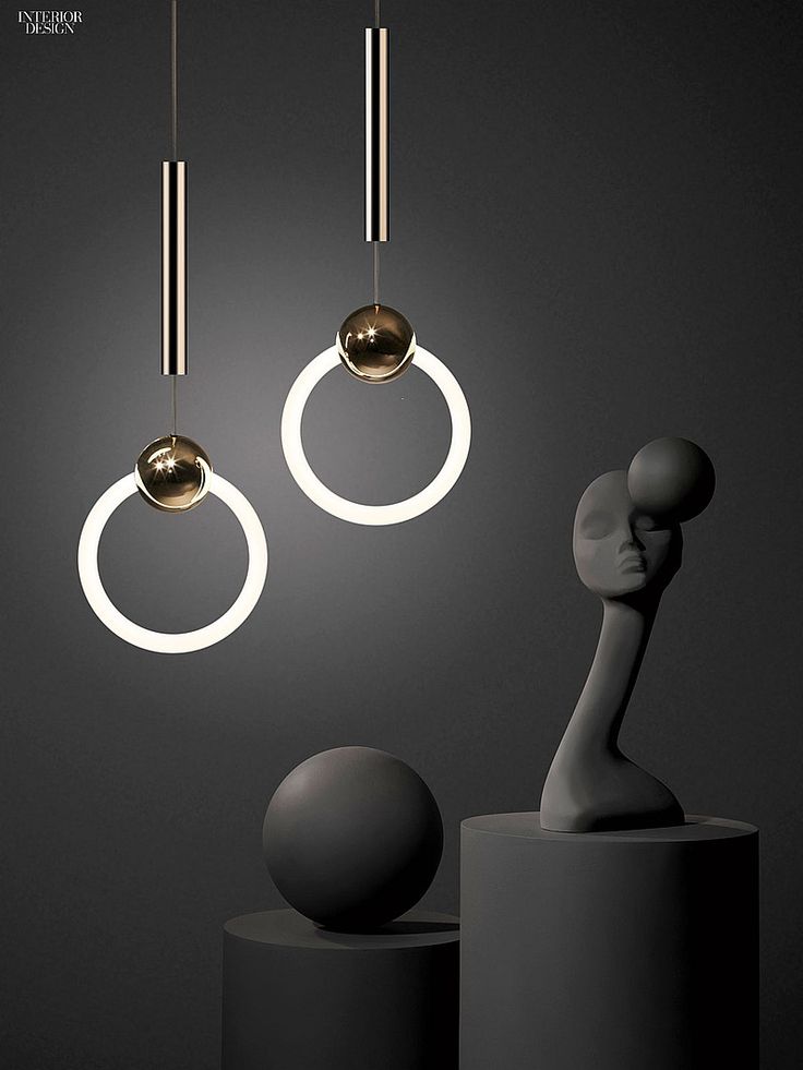 Ring pendant fixtures in polished brass with fluorescent tubes by Lee Broom. #de...