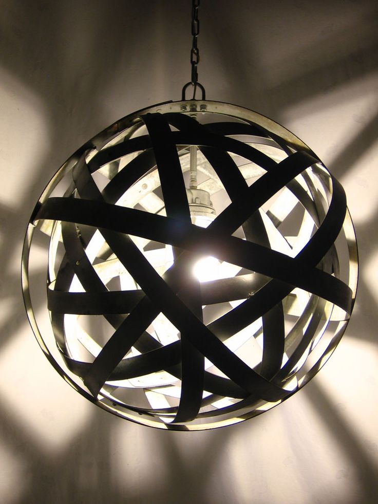 Stil Novo Design's Orbits Lamp was crafted by skillfully weaving and welding tog...