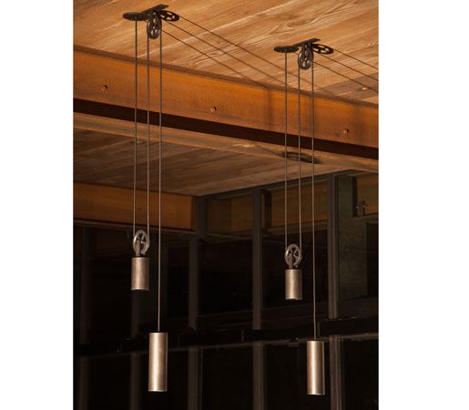 Sun Valley Bronze's Pendant Pully Light is counterbalanced by a weight, operatin...