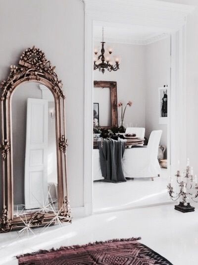 That oversized, giant and ornate mirror makes an excellent interior decor statem...